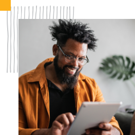 man looking at tablet