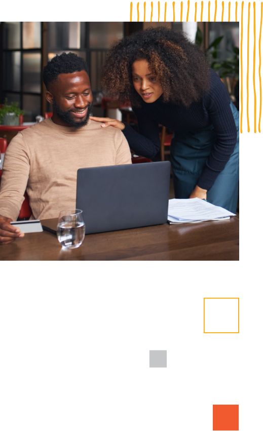 two people looking at a computer